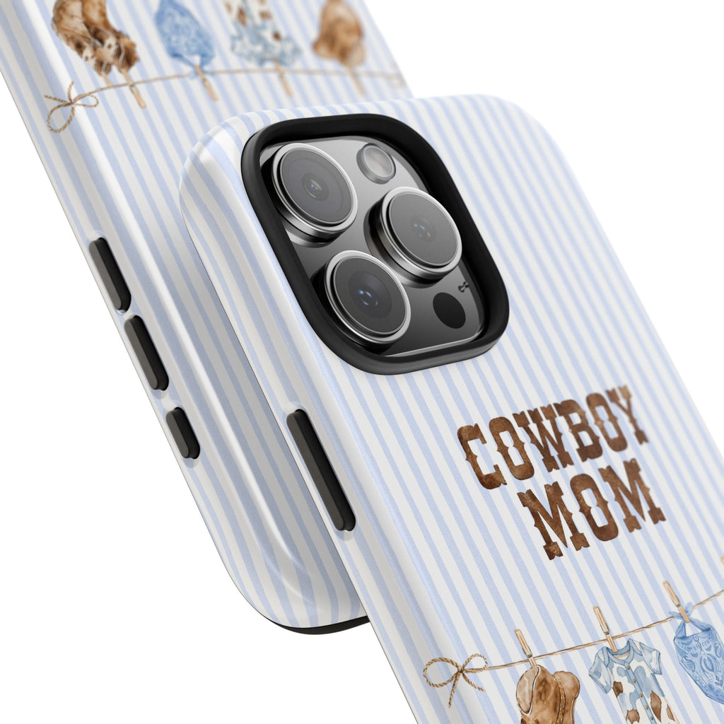 Blue striped phone case close-up with “Cowboy Mom” text and camera lens cutout opening