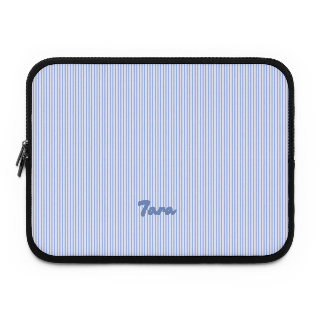 Light blue striped neoprene sleeve with black zipper trim, personalized “Tara”