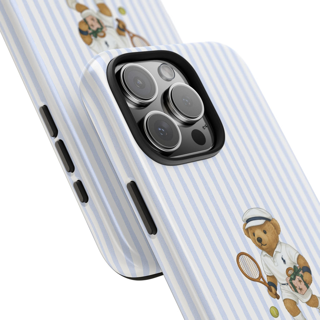 Blue-and-white striped phone case close-up with tennis teddy bear and camera lenses