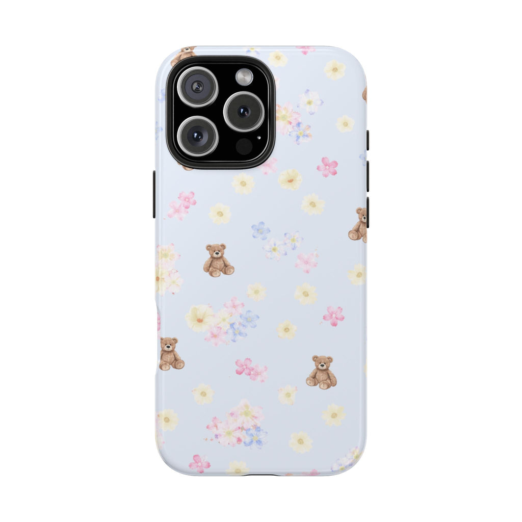 Light blue phone case with teddy bears and scattered flowers, camera cutout