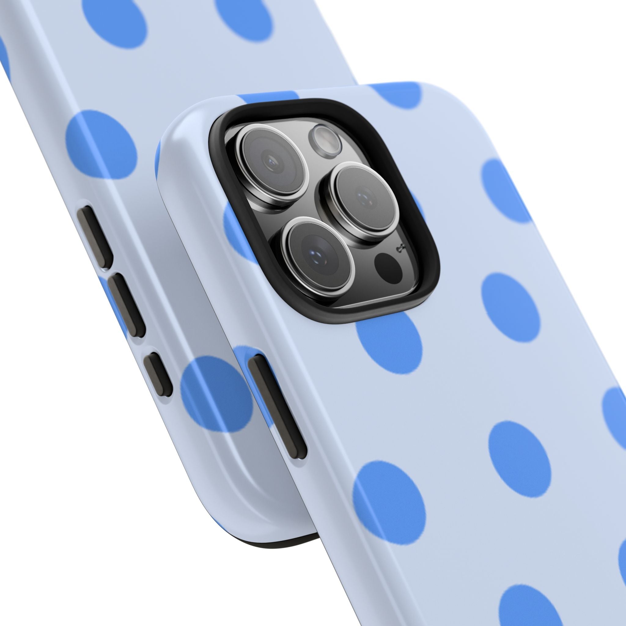 Polka dot phone case corner close-up showing camera lenses and cutouts