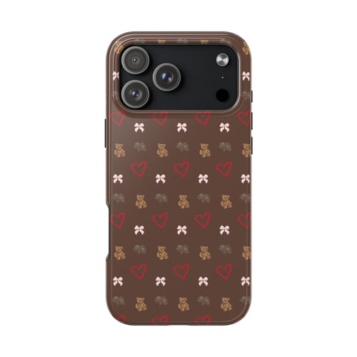 Brown coquette phone case with teddy bears, hearts, bows pattern; camera cutout