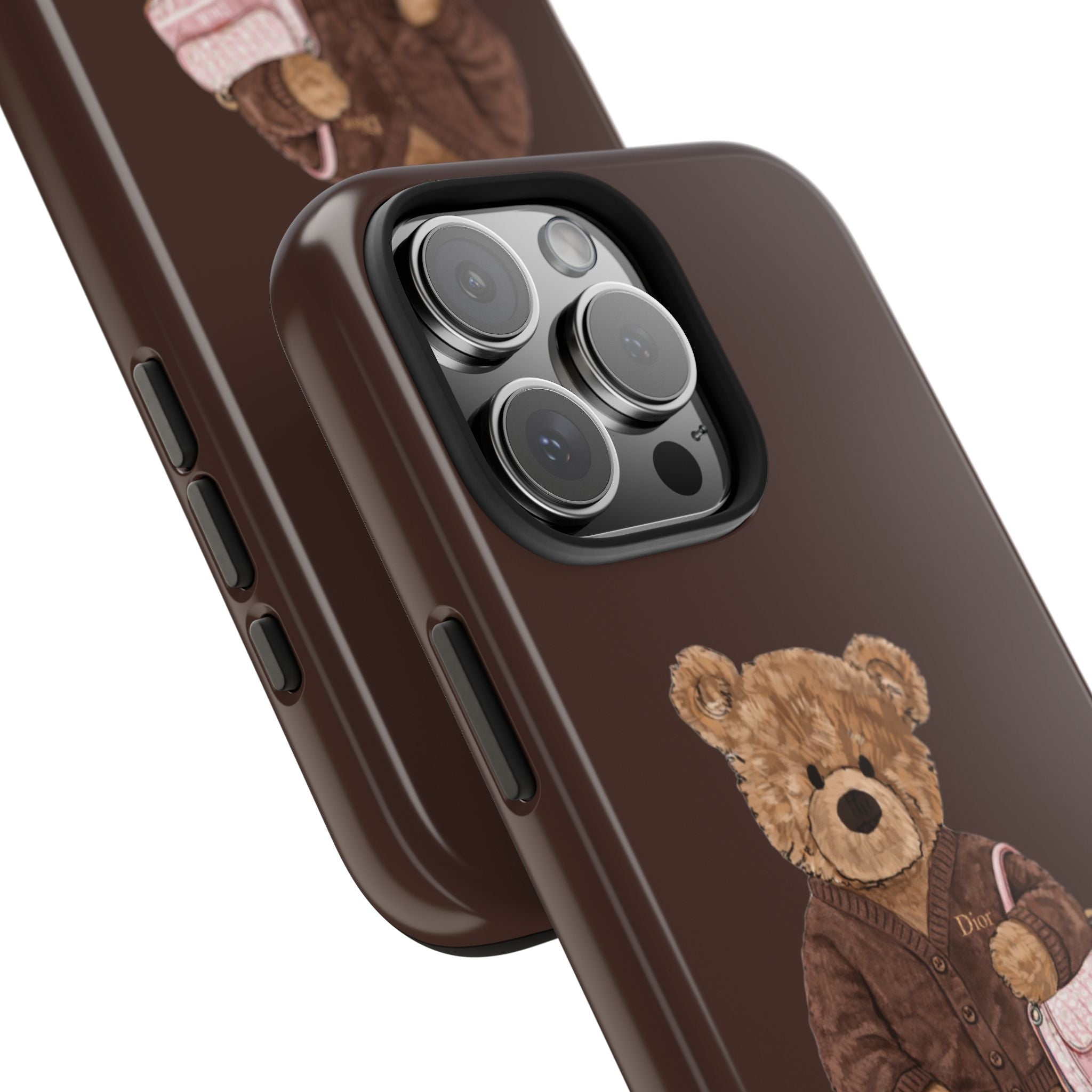 Brown Dior teddy bear phone case detail with side buttons and raised camera lenses
