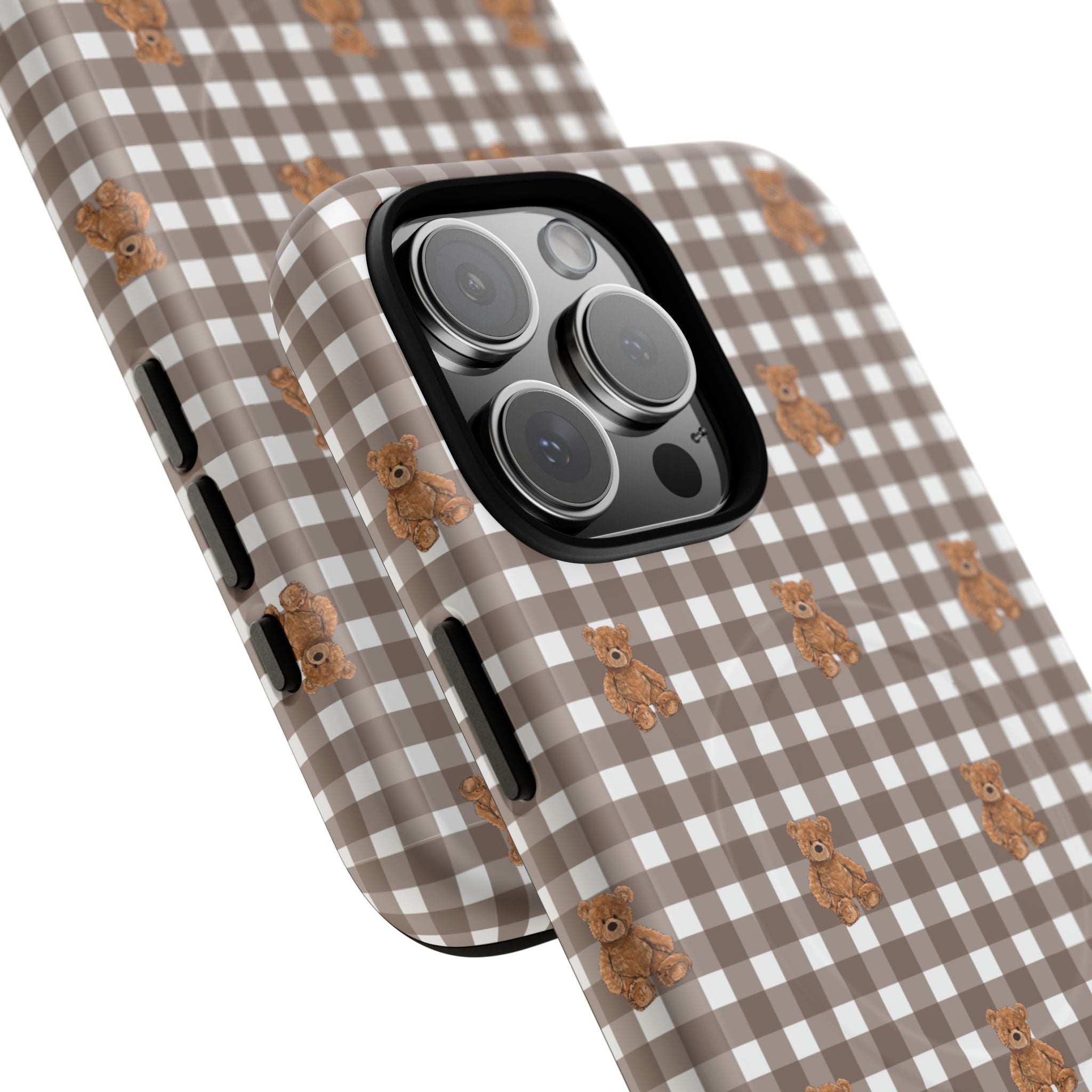 Angled brown gingham phone case with teddy bears and protective raised camera rim