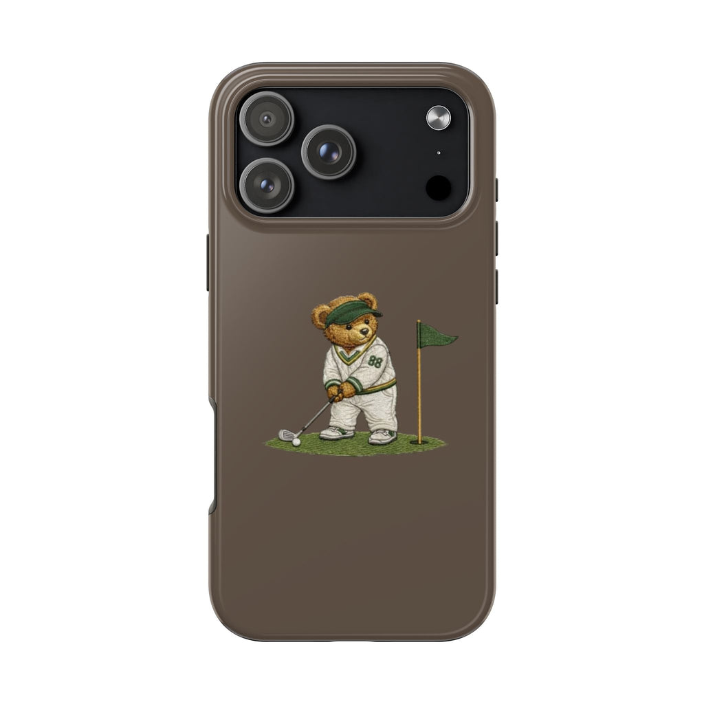Brown phone case with cartoon bear golfer holding club near green flag