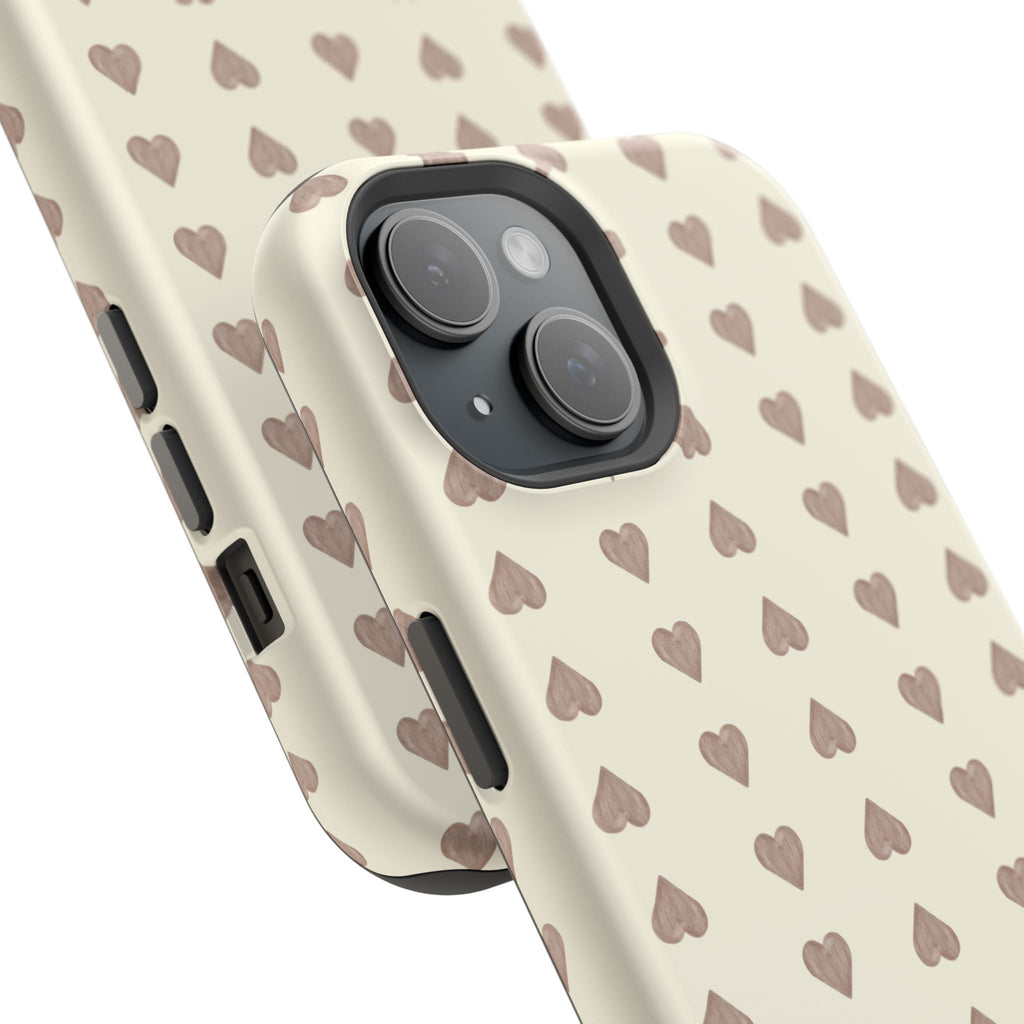 Cream phone case with brown hearts pattern; side buttons and raised camera rings
