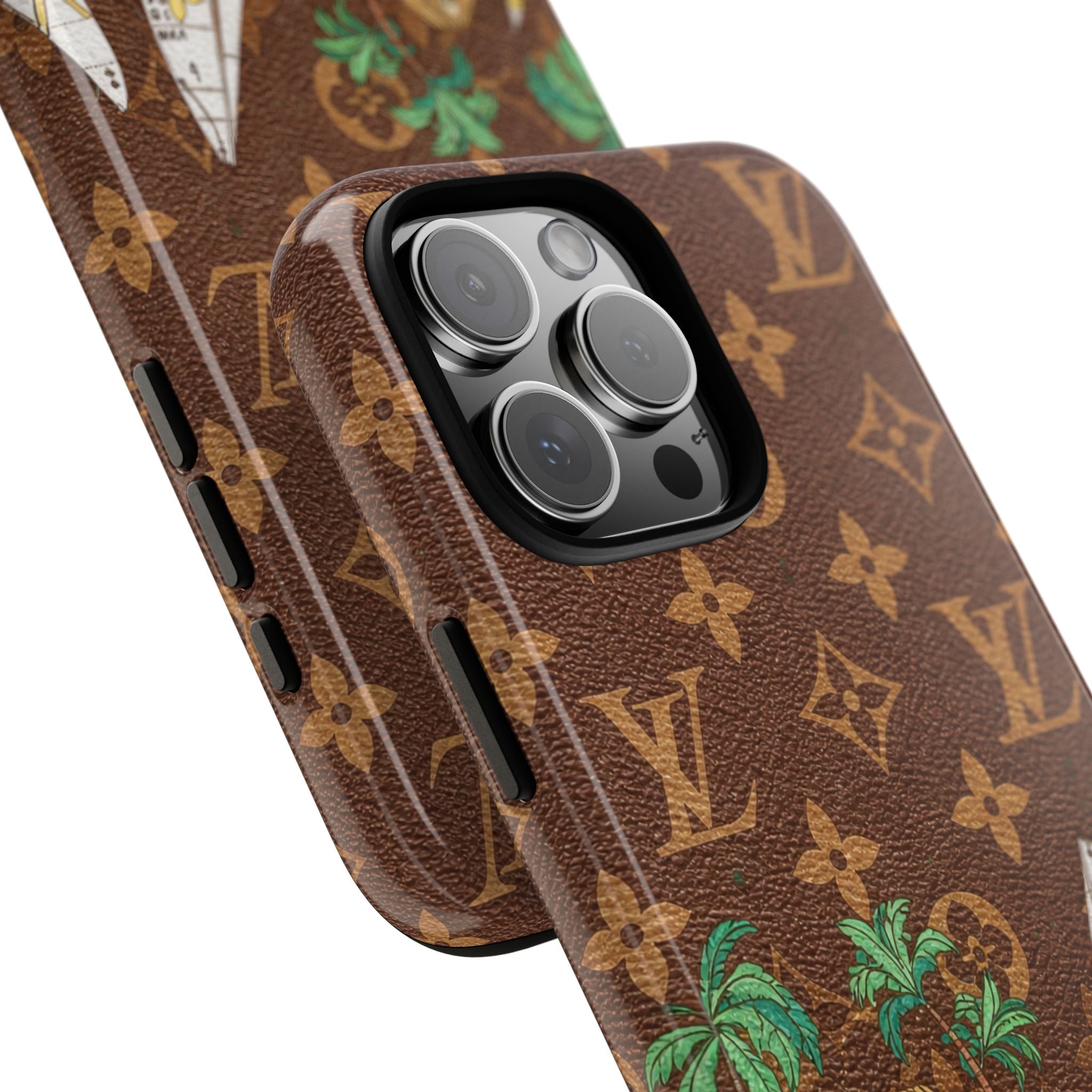 Angled close-up: brown monogram phone case with beach graphic and raised camera lens rings