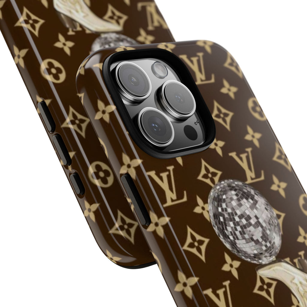 Angled view brown phone case with LV monogram, disco boots graphic, and camera cutouts