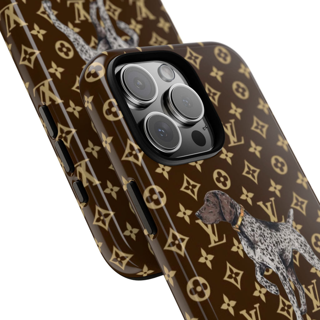 Angled brown monogram phone case with spotted dog artwork and side button cutouts