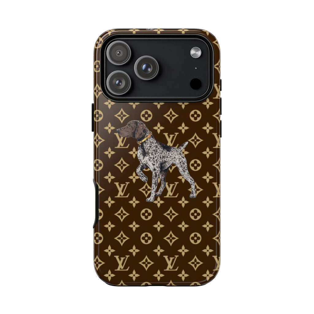 Brown monogram phone case with spotted dog graphic, dual camera lenses visible
