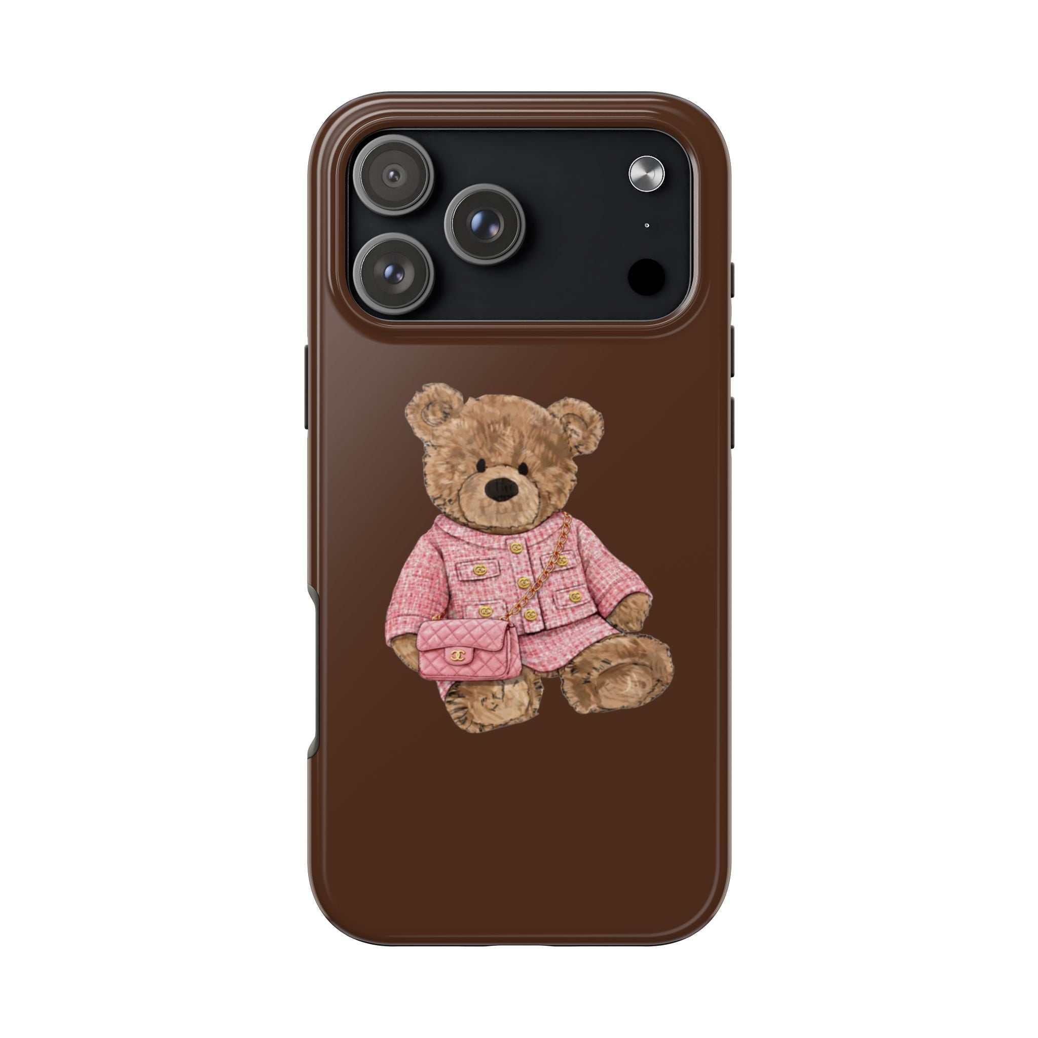 Brown phone case with teddy bear in pink tweed outfit, teddy holding small purse