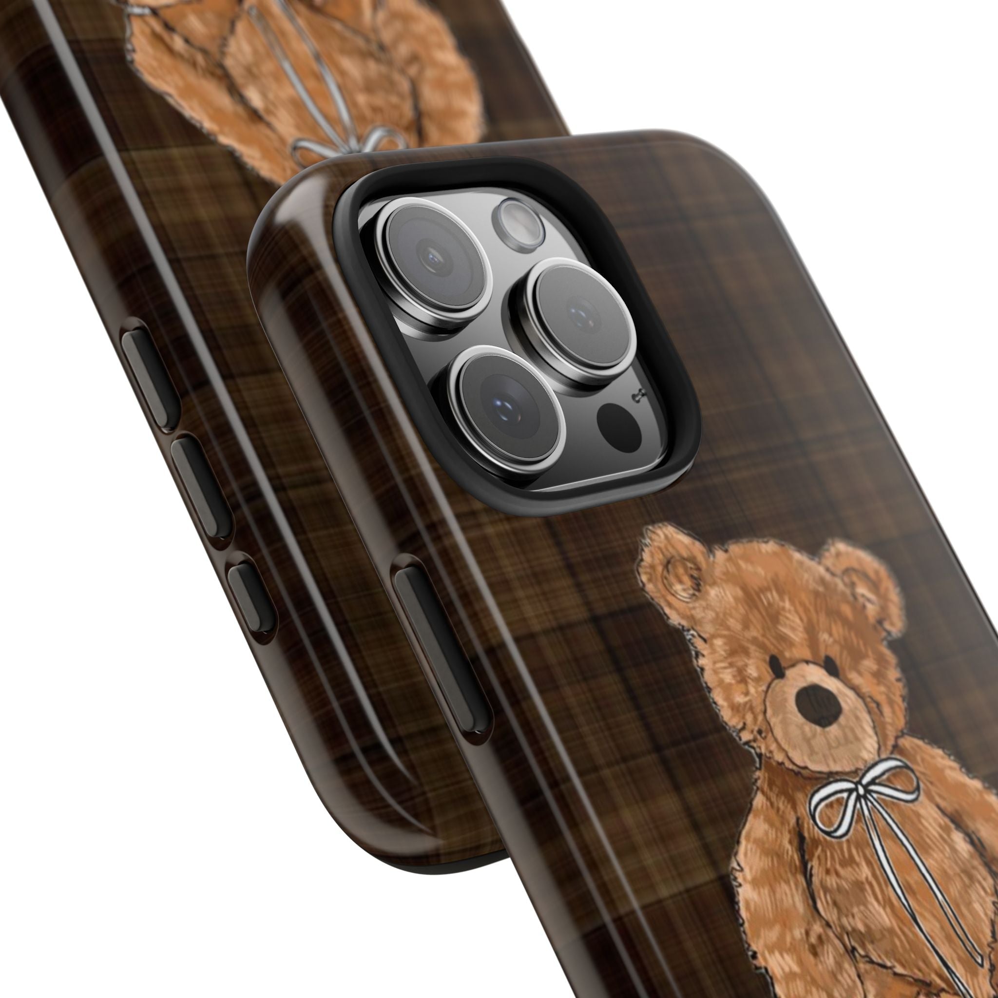 Brown plaid phone case close-up of side buttons and teddy bear bow