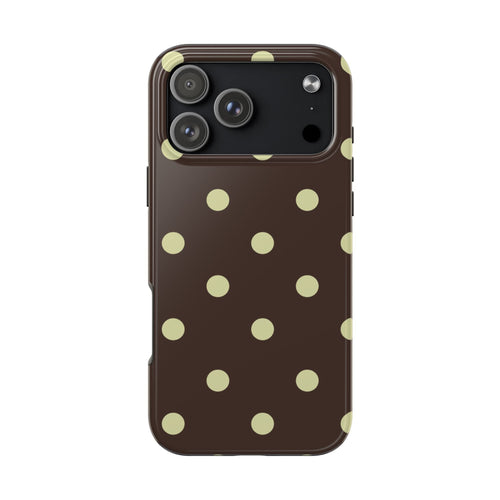 Brown phone case with pale green polka dots, camera window on top corner