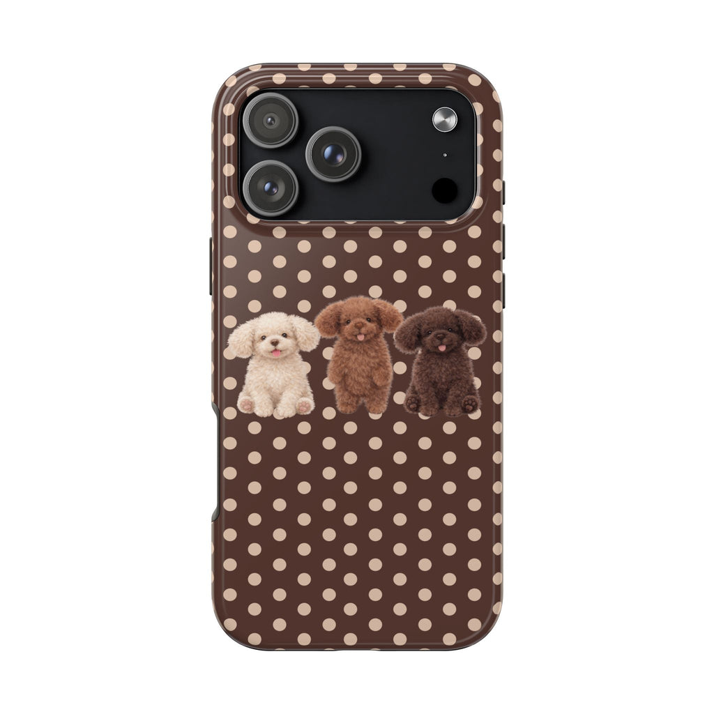 Brown polka-dot phone case with puppy trio under camera cutout, slim protective design