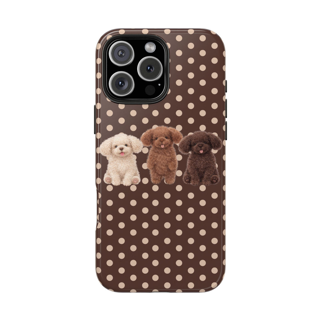 Brown polka-dot phone case with three puppy faces across front, cute dog illustration