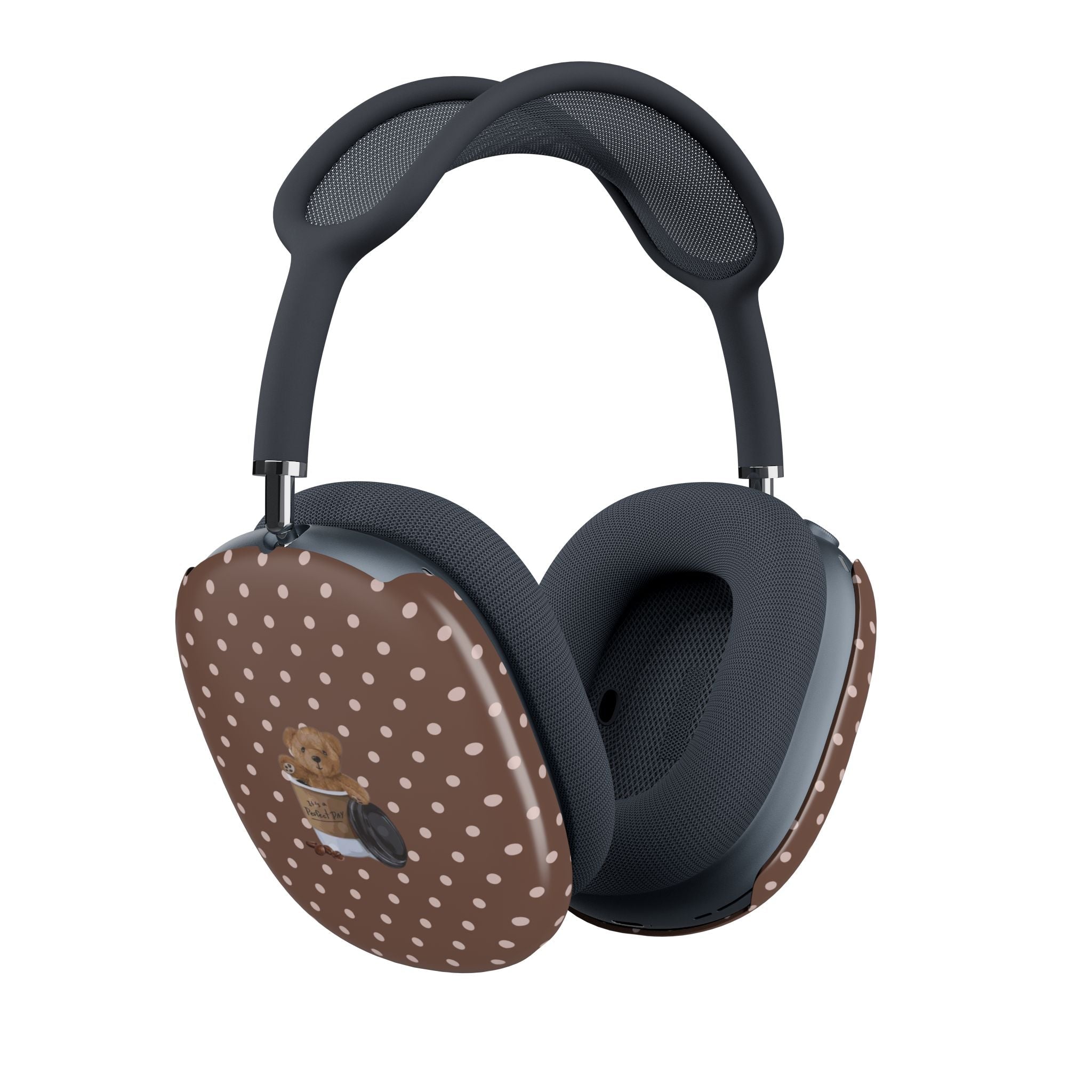 Brown polka dot ear cup cover with teddy bear illustration on headphones