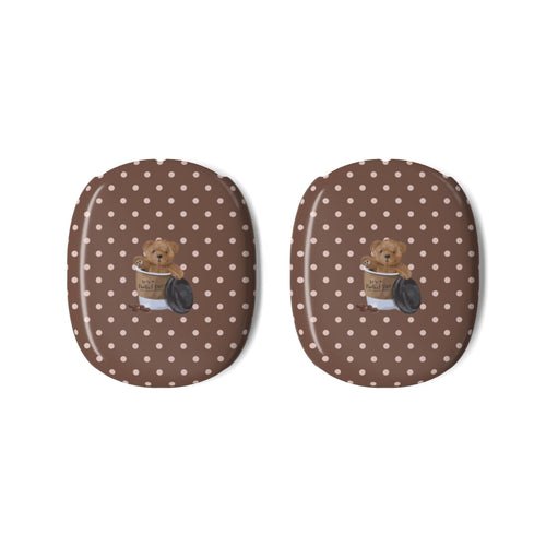 Two ear cup covers in brown with white polka dots and teddy bear graphic