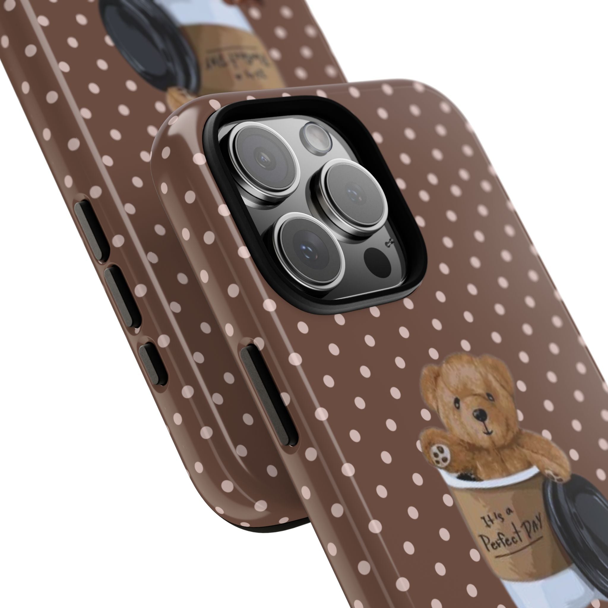Brown polka dot phone case with teddy bear coffee cup graphic near camera cutouts