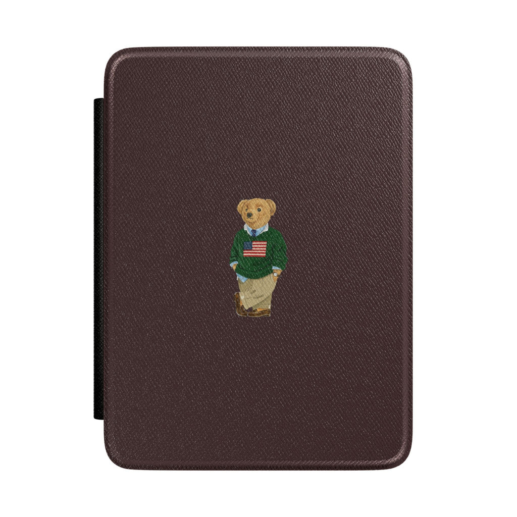 Brown hardcover Kindle case with teddy bear emblem and side stand