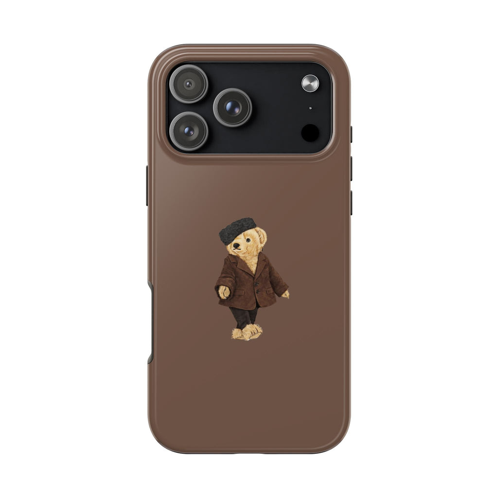 Brown phone case with embroidered teddy bear in a dark suit jacket