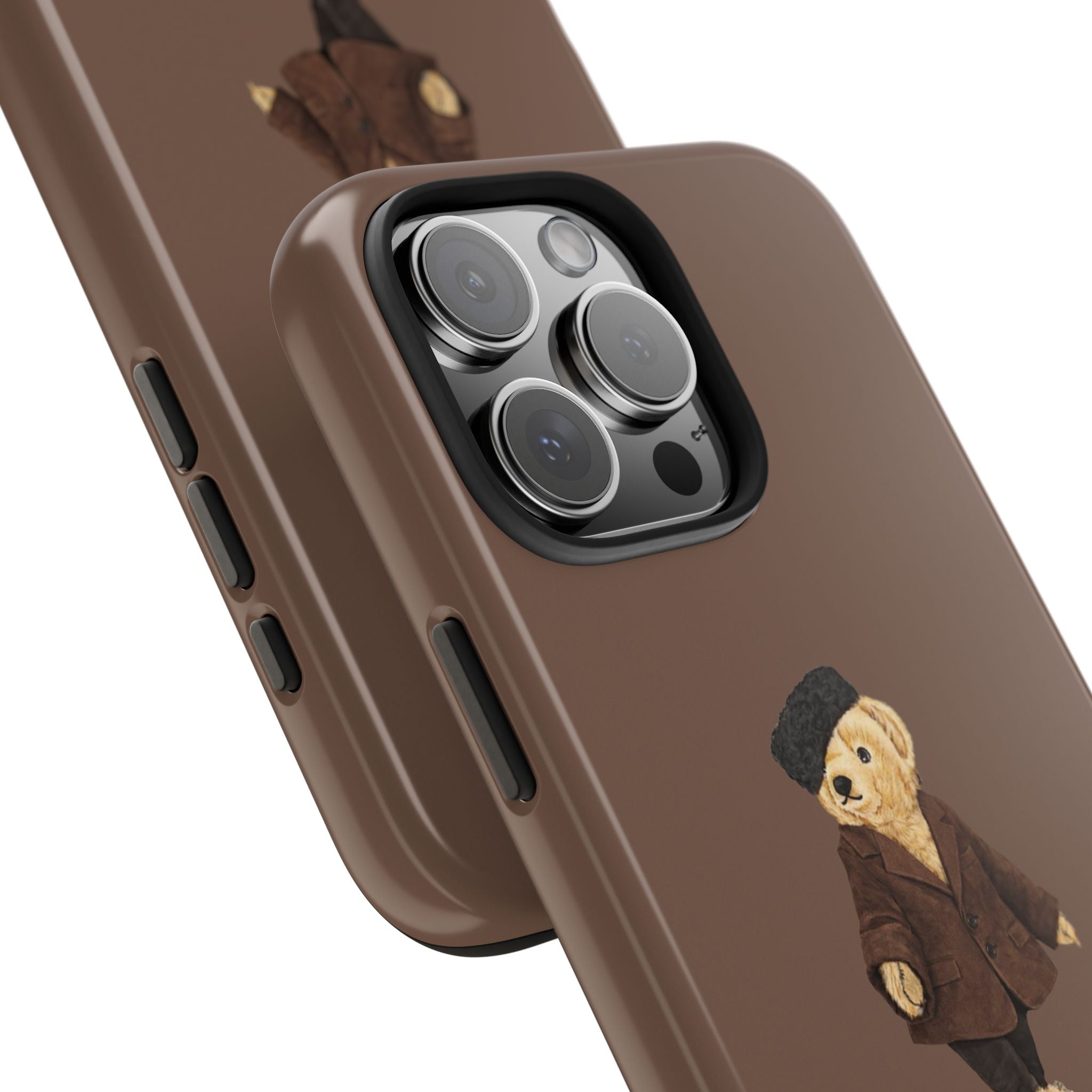Brown phone case angled view; teddy bear embroidery by side buttons and camera lenses