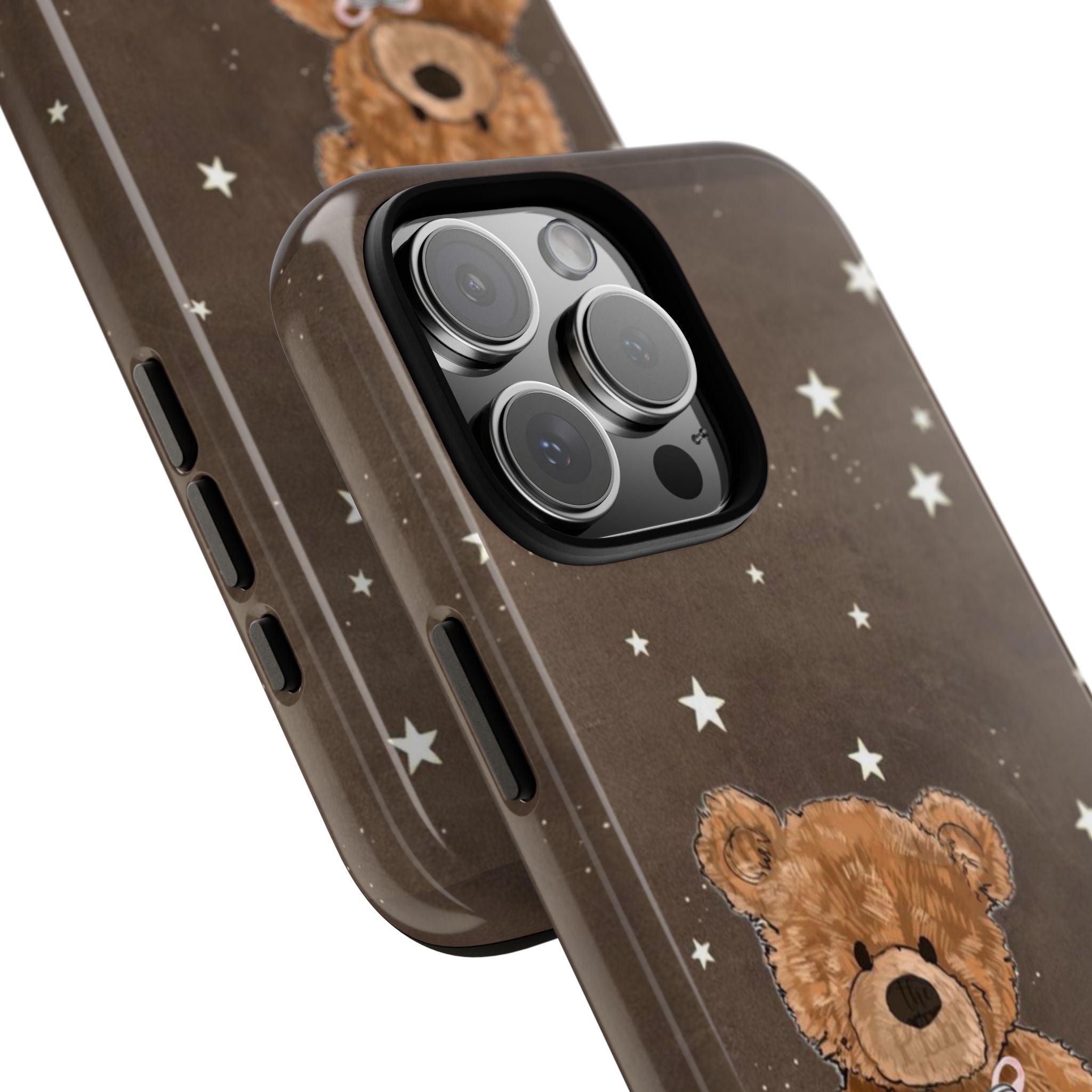 Brown teddy bear phone case corner close-up with star pattern and camera cutout