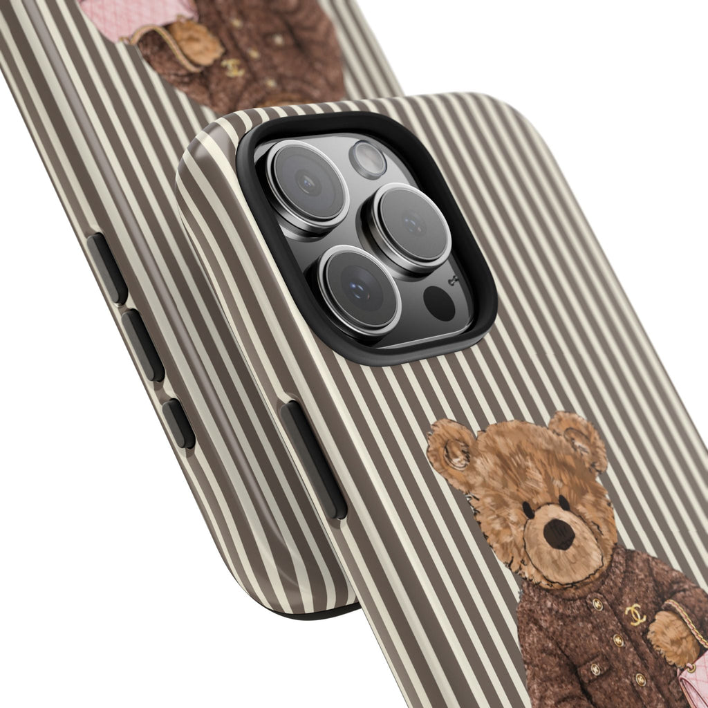 Angled brown striped phone case with teddy bear detail and camera lenses visible