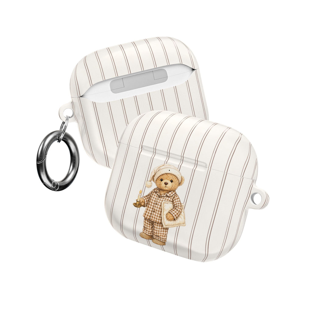 Striped AirPods case with teddy bear wearing night cap, two metal keyrings visible