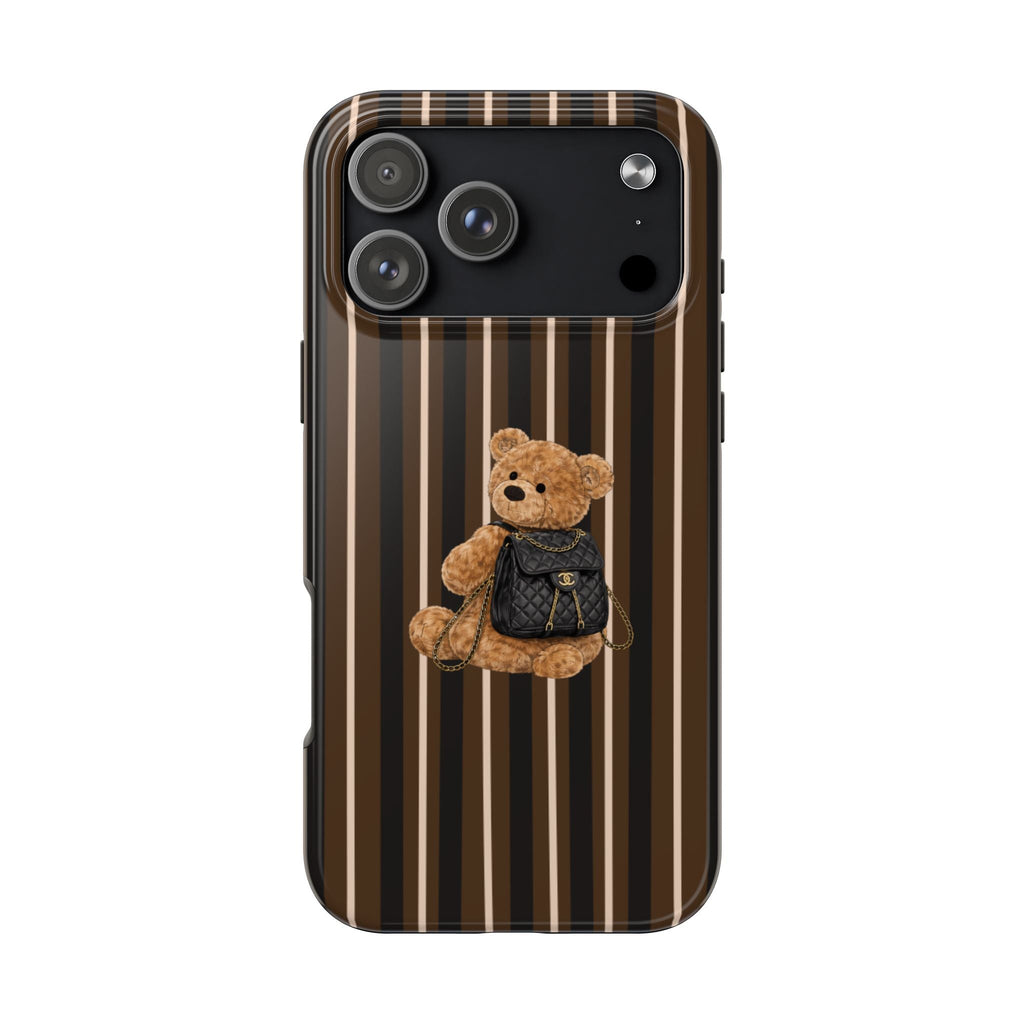 Brown vertical striped phone case with teddy bear backpack charm