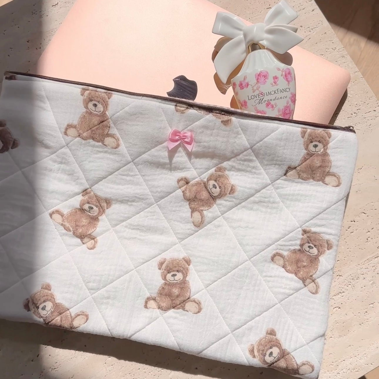 White quilted teddy bear laptop sleeve, pink bow accents, brown zipper top