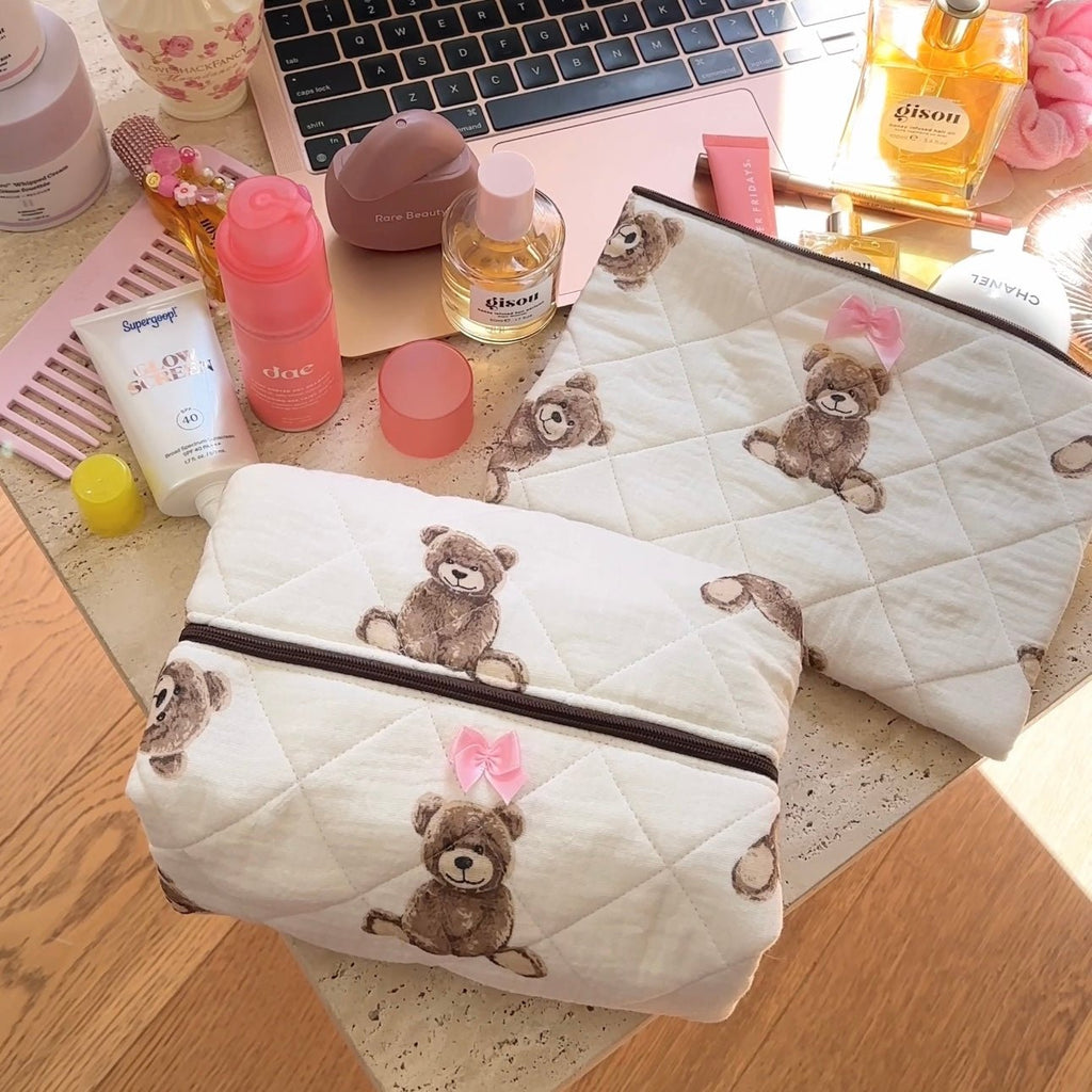 Quilted white teddy bear zip pouch with pink bow and allover brown bear print