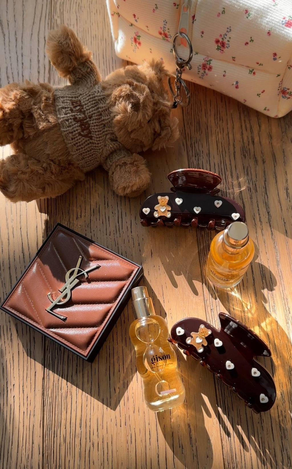 Dark brown hair claw clip with teddy bear, heart and pearl-like studs on prongs