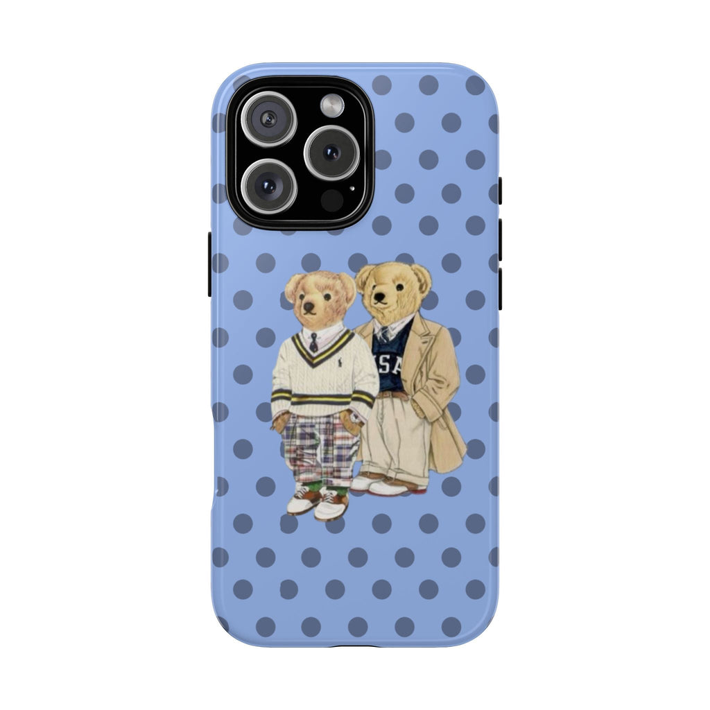 Light blue phone case with dark polka dots and two teddy bear kids in outfits