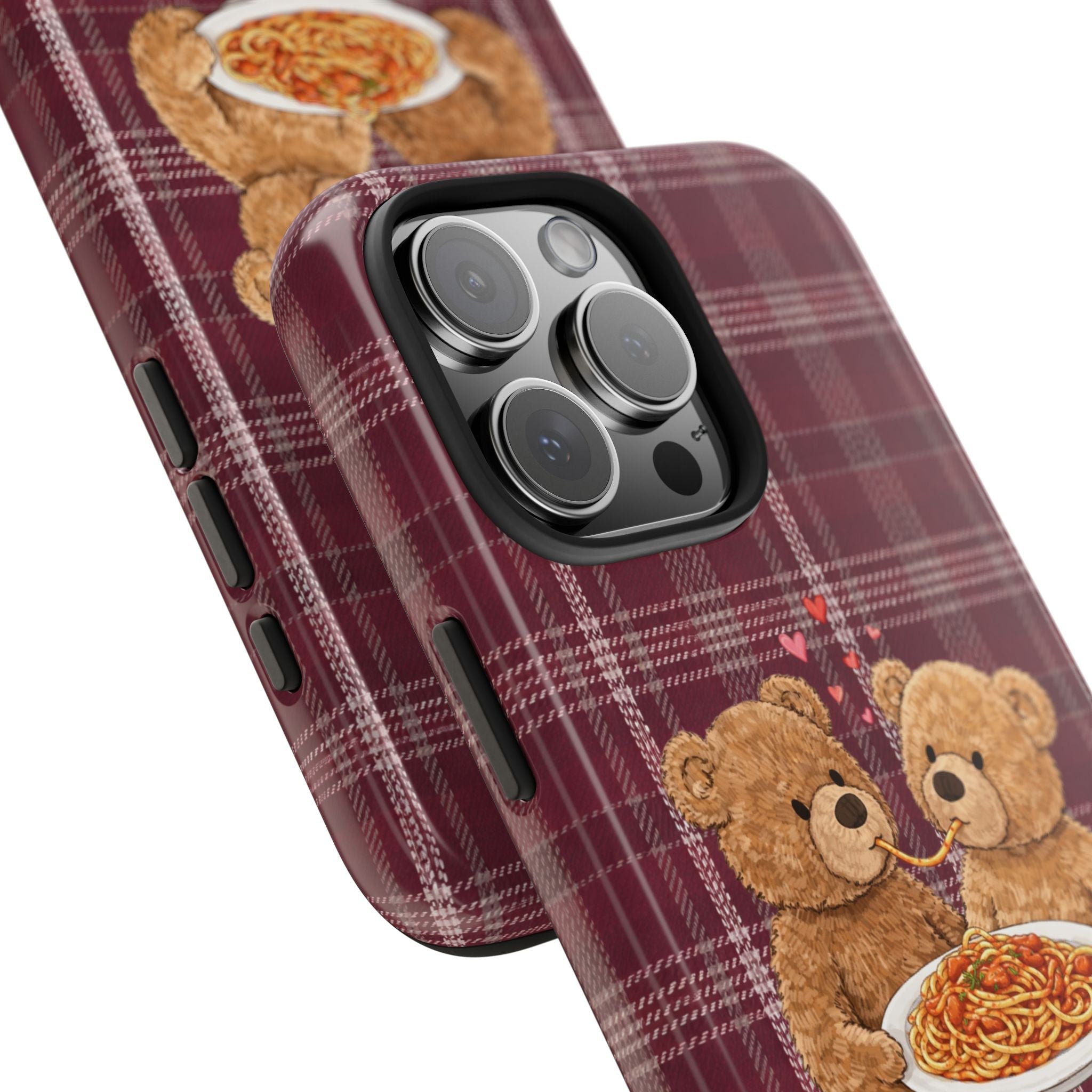Burgundy plaid phone case with teddy bear design near camera cutout and side buttons