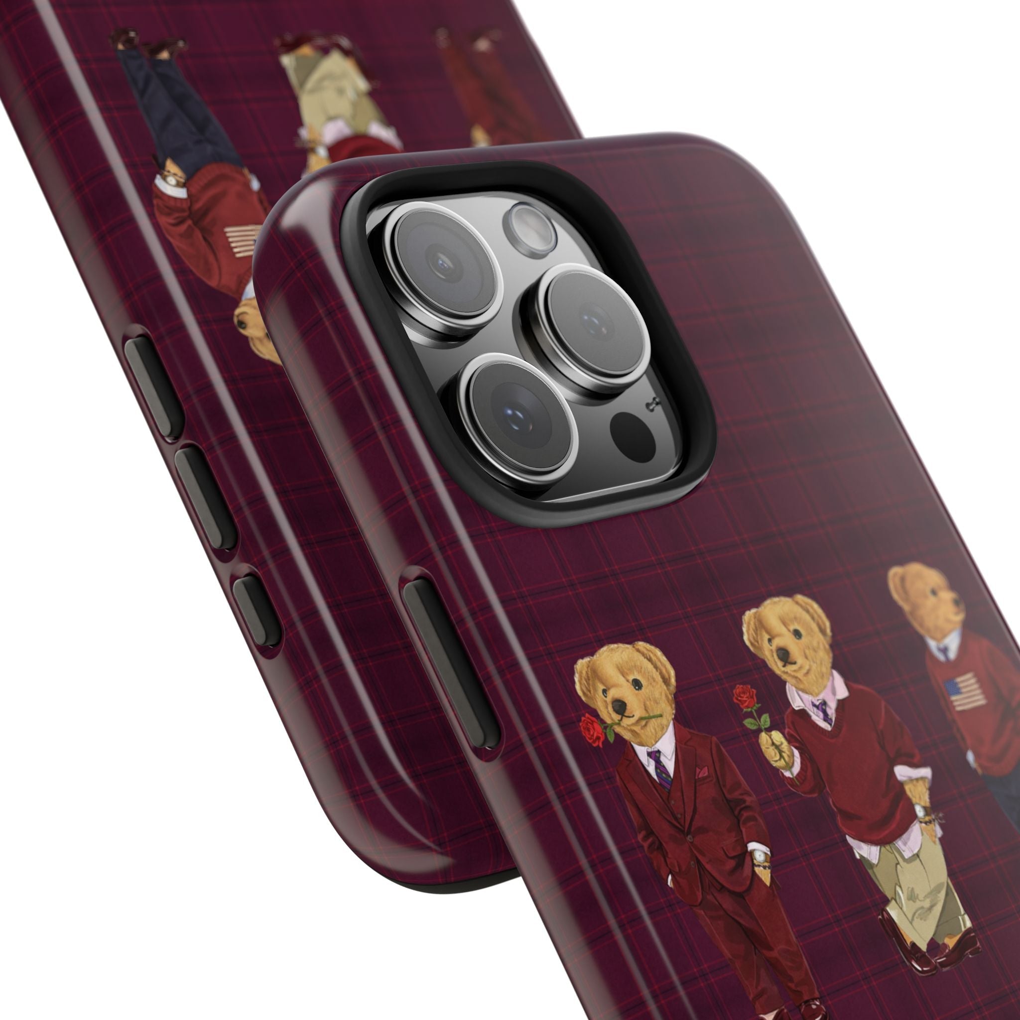 Burgundy plaid phone case close-up with teddy bear figures and camera cutouts