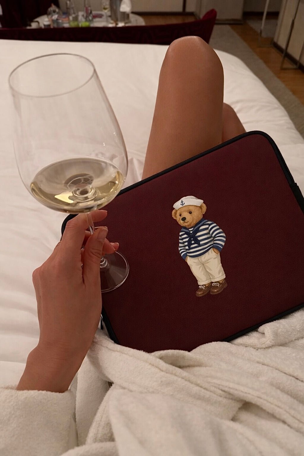 Burgundy neoprene Kindle/iPad/laptop sleeve with sailor bear patch and black trim