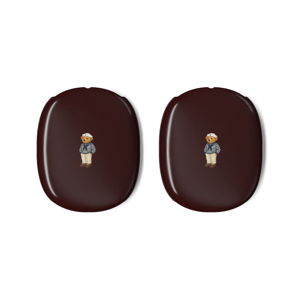 Pair of burgundy AirPods Max ear cup covers with sailor teddy bear emblem, oval shape
