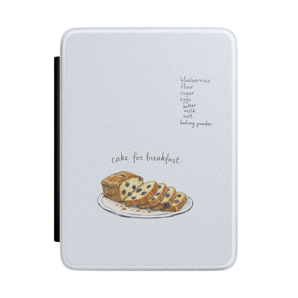 Light gray Kindle hardback case, cake slice illustration, 'cake for breakfast' text