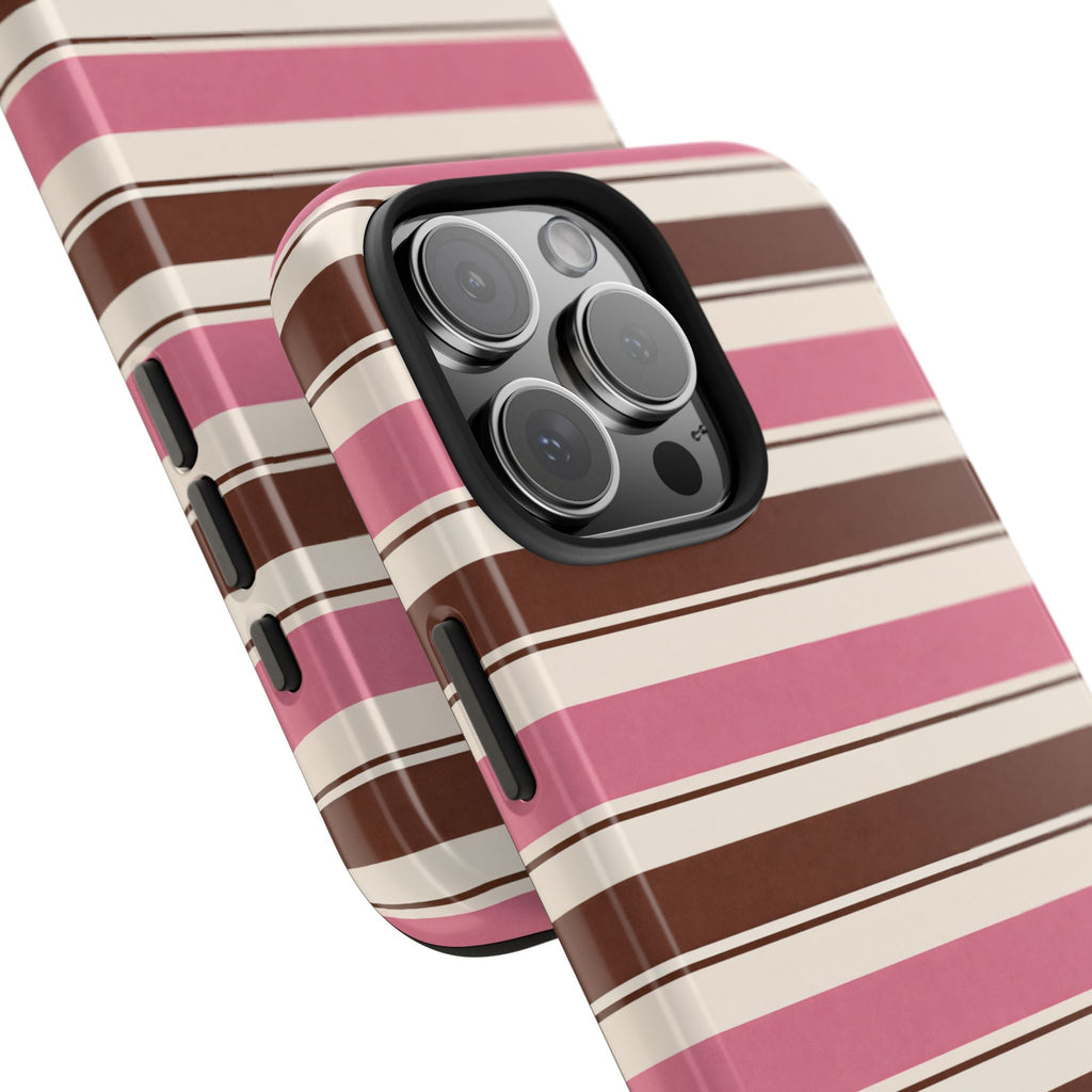Close-up: pink, white, and brown horizontal stripes phone case with camera cutouts