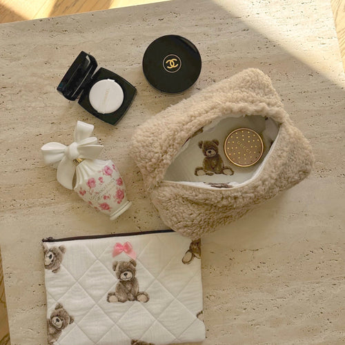 Camel teddy bear sherpa pouch with zipper opening and stitched bear patch inside