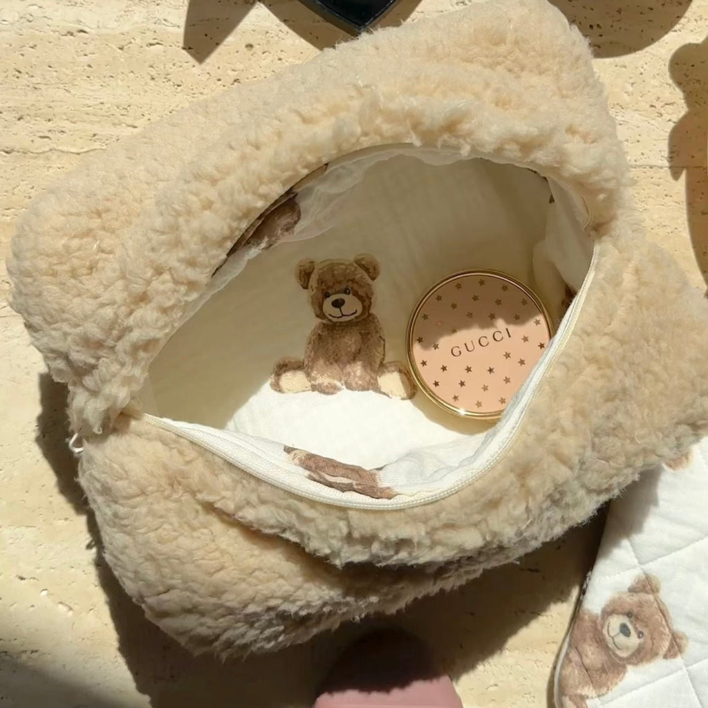 Camel teddy bear sherpa pouch with zipper opening and bear face print on lining
