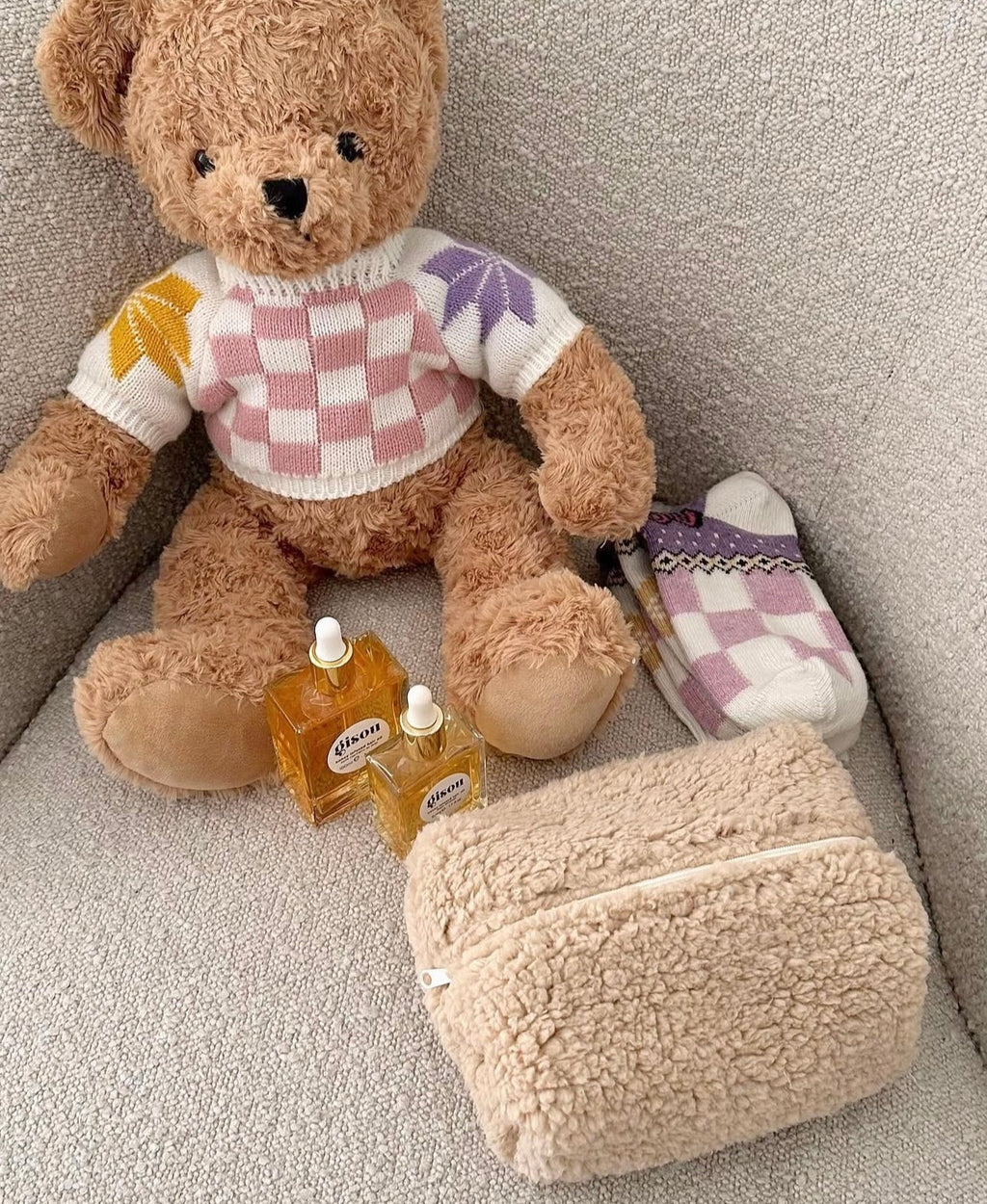 Soft teddy bear with lavender plaid sweater and matching sherpa pouch, beige teddy companion