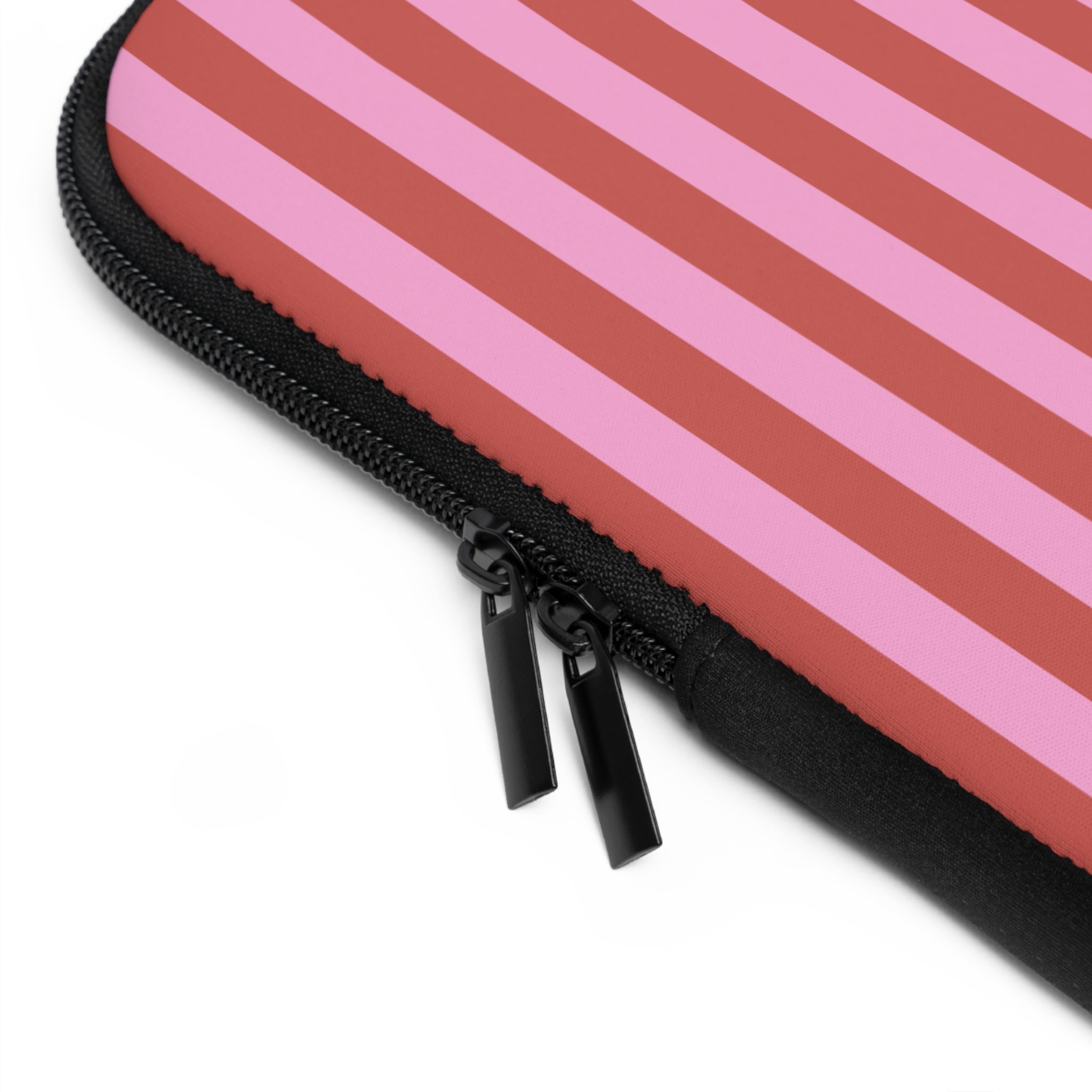 Candy cane striped neoprene sleeve corner with black zipper and pull tabs