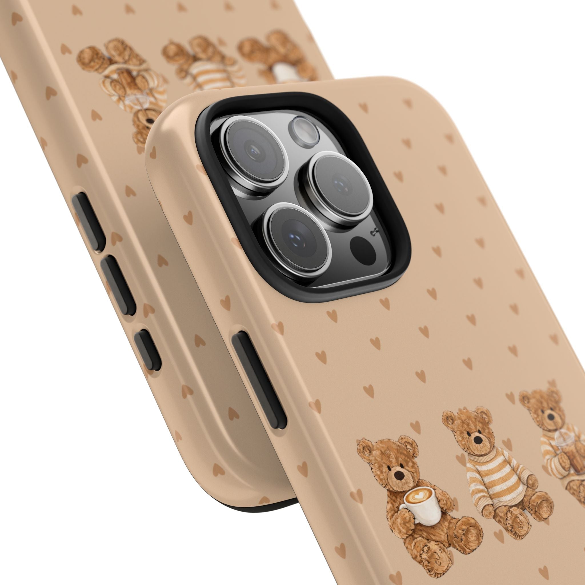 Angled view: beige phone case with teddy bears, heart pattern, and camera cutout