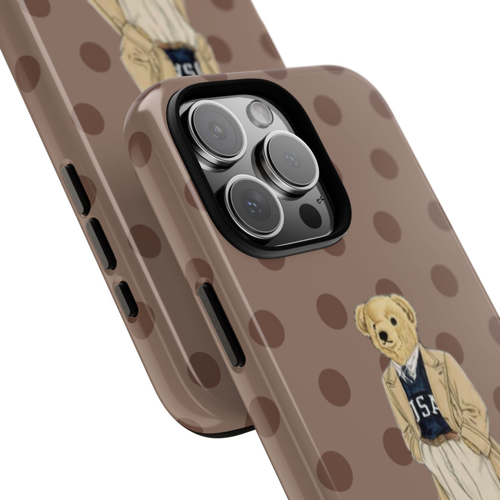 Side view brown polka dot phone case with teddy bear motif and camera lens openings