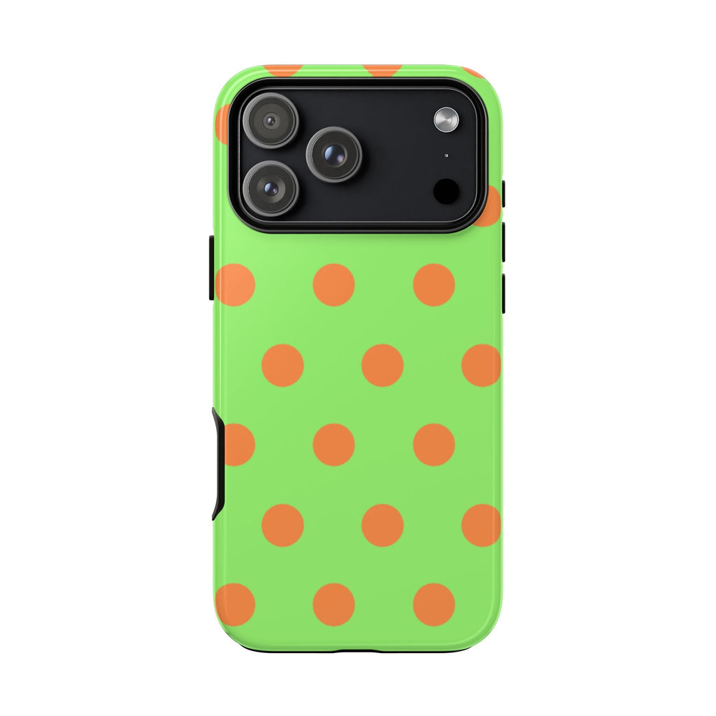Green phone case with orange polka dots, camera opening and side button cutouts
