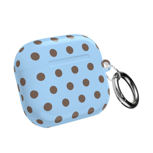 Blue AirPods case with brown polka dots and metal key ring, closed