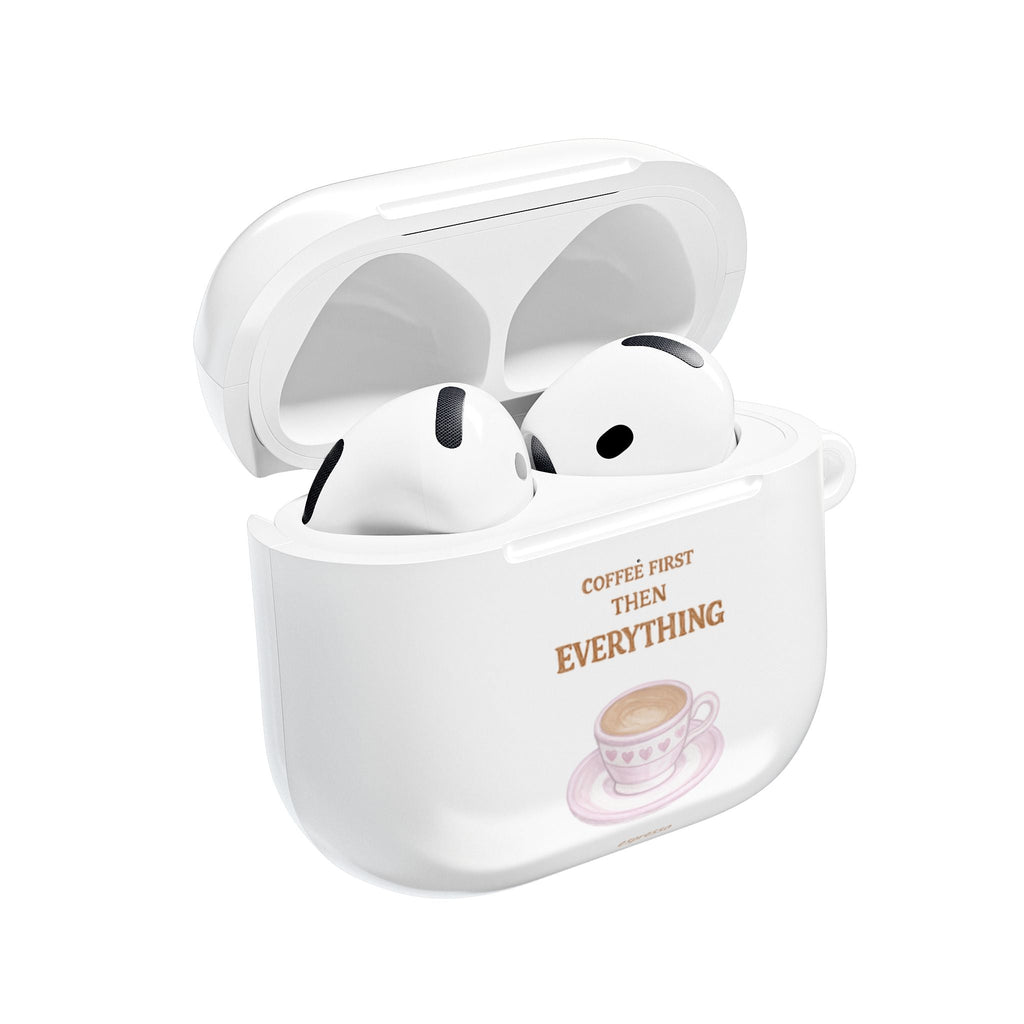 White AirPods case, open lid with coffee quote and earbuds inside