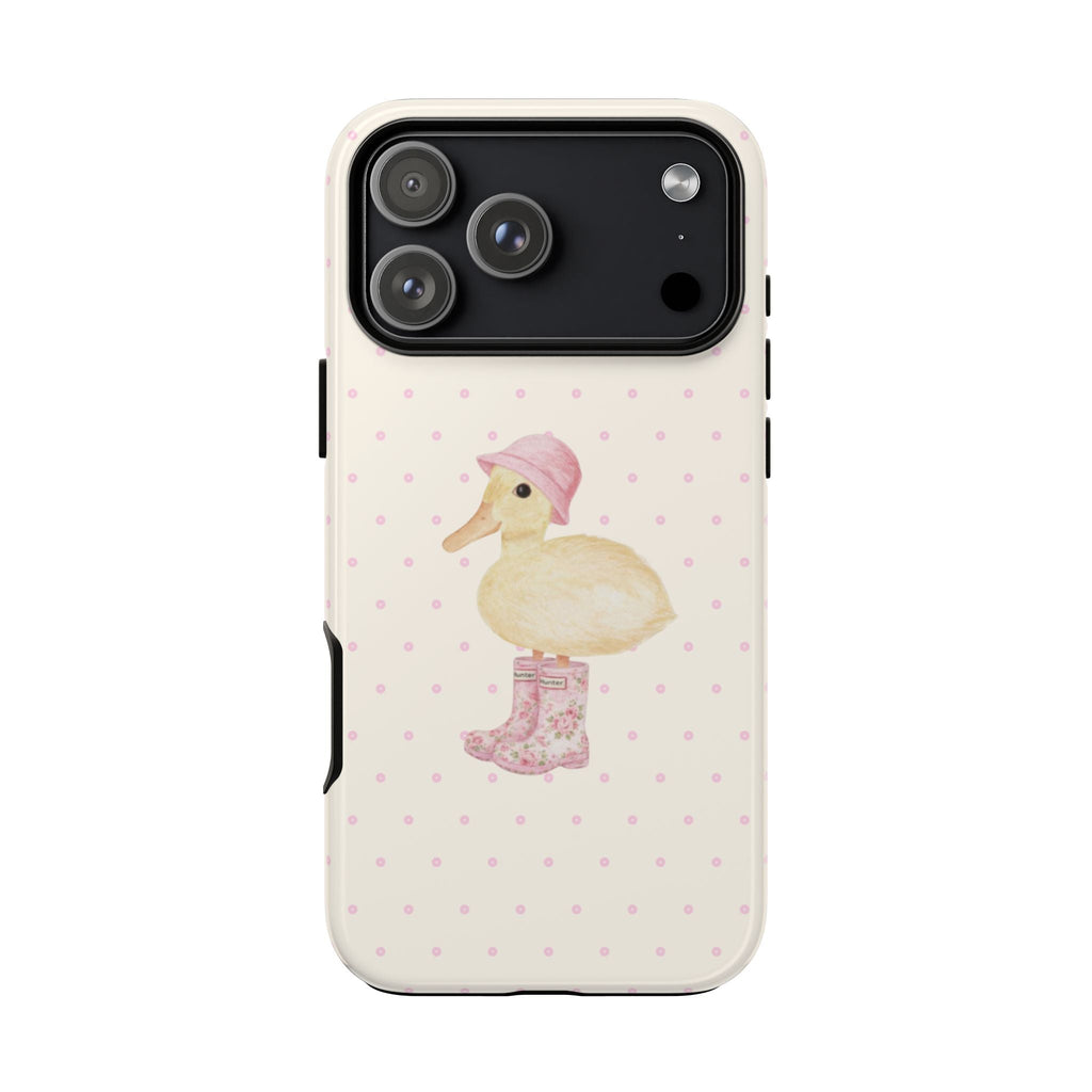Cream phone case with pink dot pattern and duck graphic, rear camera module visible