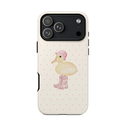Cream phone case with pink dot pattern and duck graphic, rear camera module visible